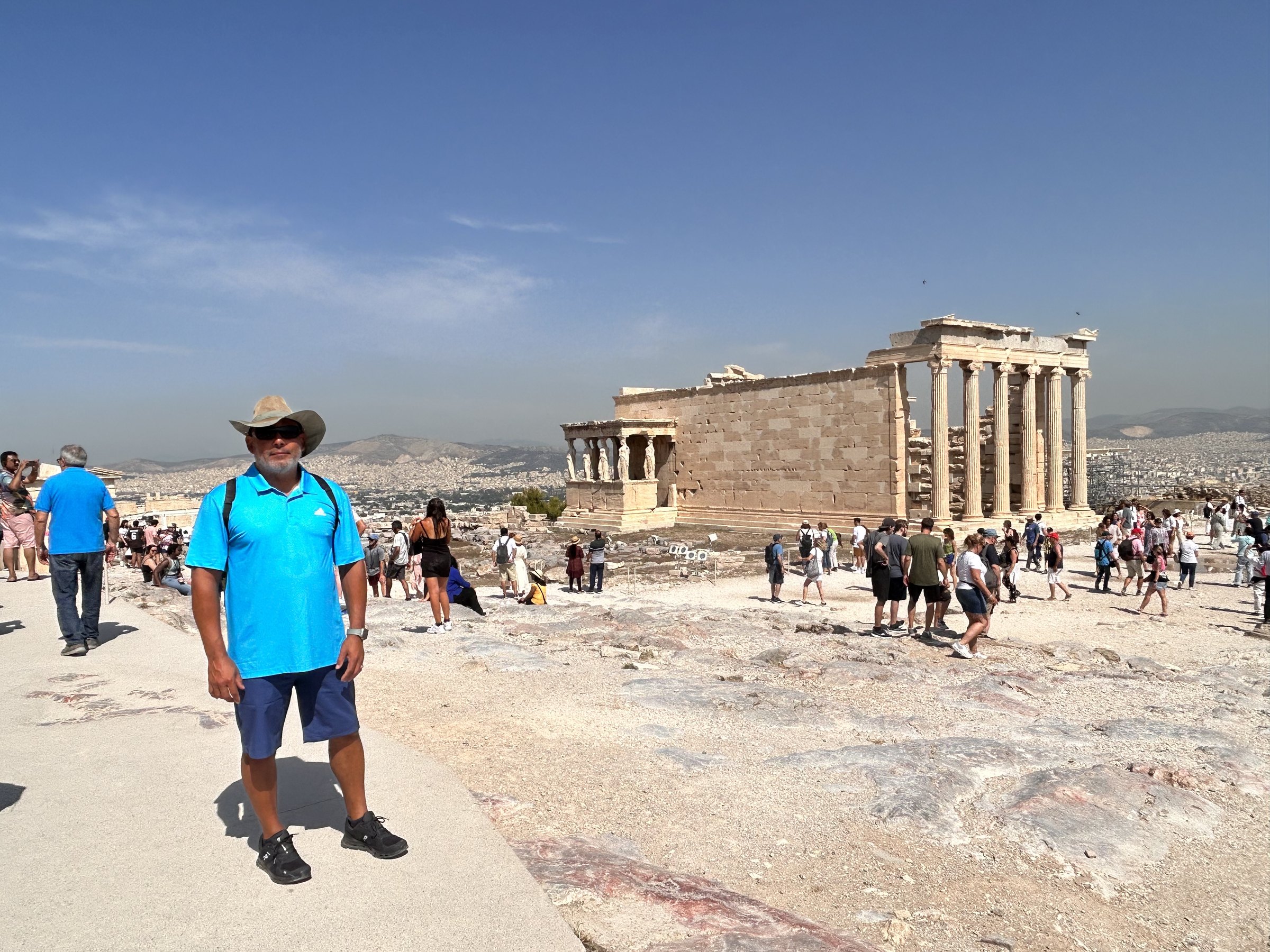 Hiram standing on the Acropolis with the Erechtheion behind him