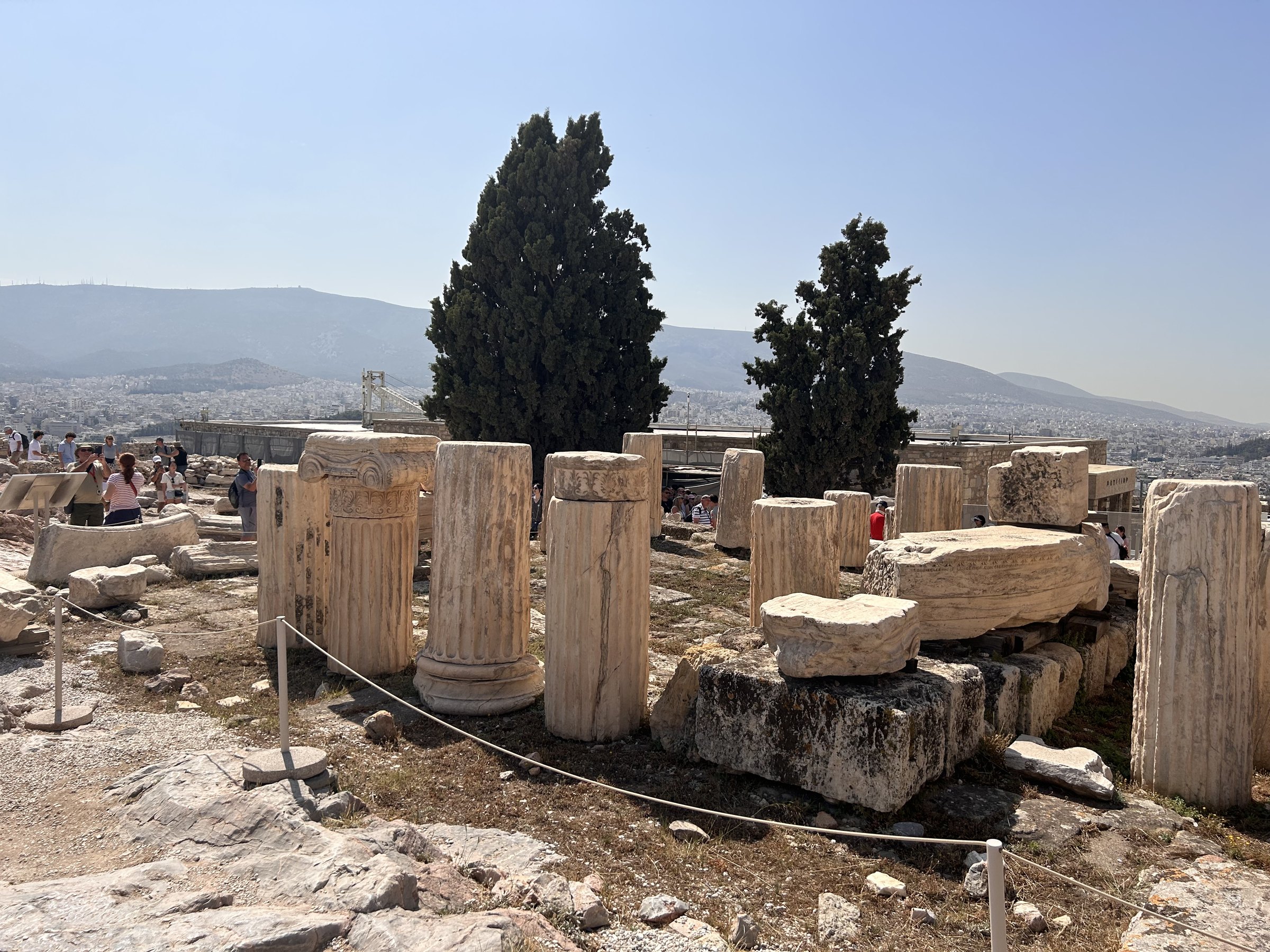 Ancient carved columns and stone fragments on the Acropolis