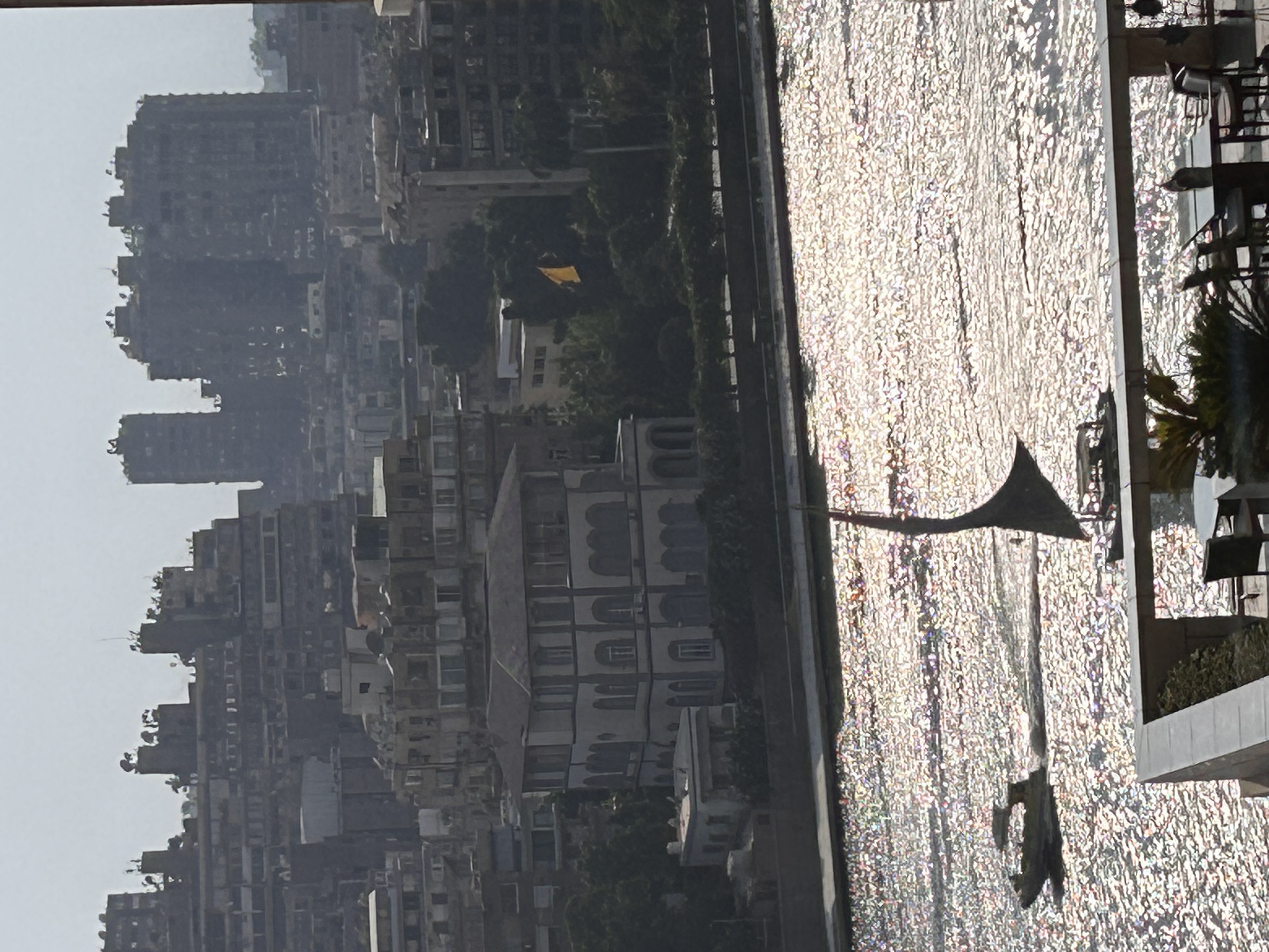 Traditional sailboats moving along the Nile beneath the Cairo skyline