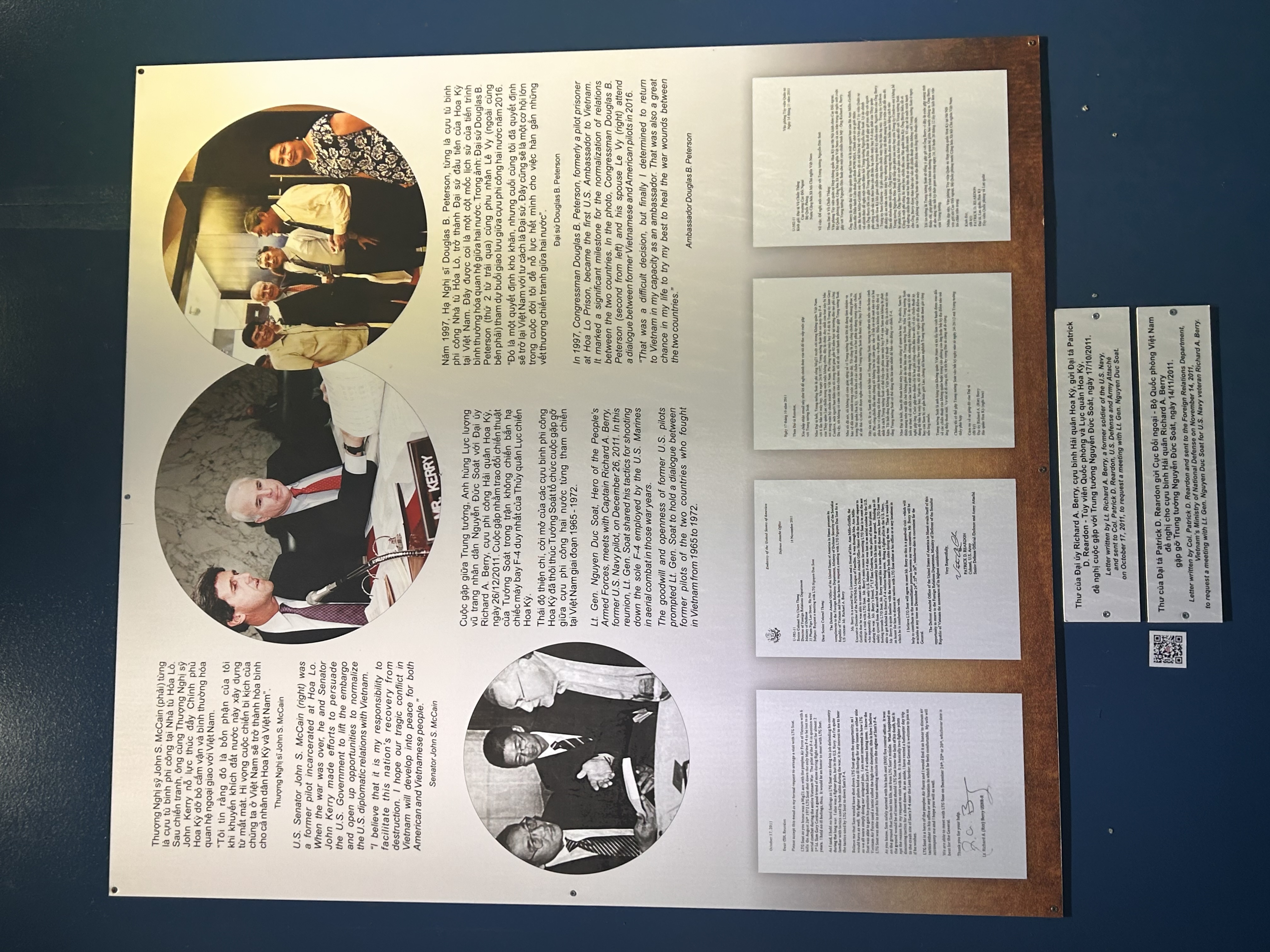War Remnants Museum exhibit about former American and Vietnamese combatants working toward reconciliation